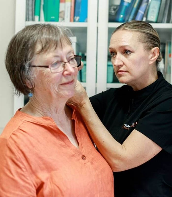 A senior female having earwax removed at Hear At Home Mobile Hearing Clinic in North Vancouver