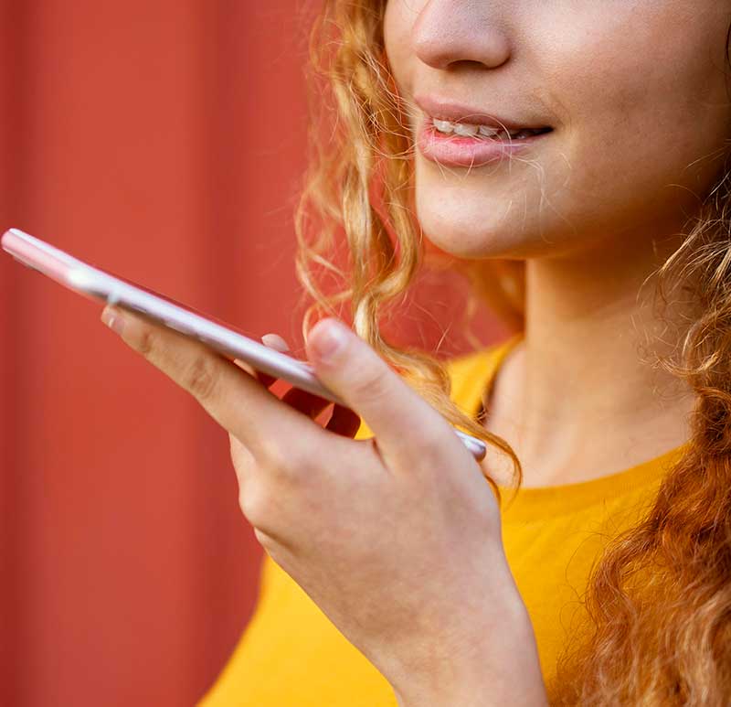 close-up-girl-holding-smartphone
